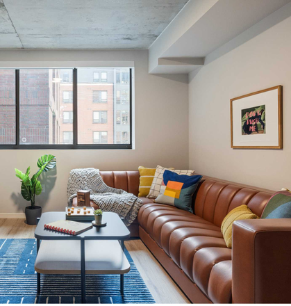 Living room - Image from the Hub Website, not of actual unit - Hub Apartments College Park