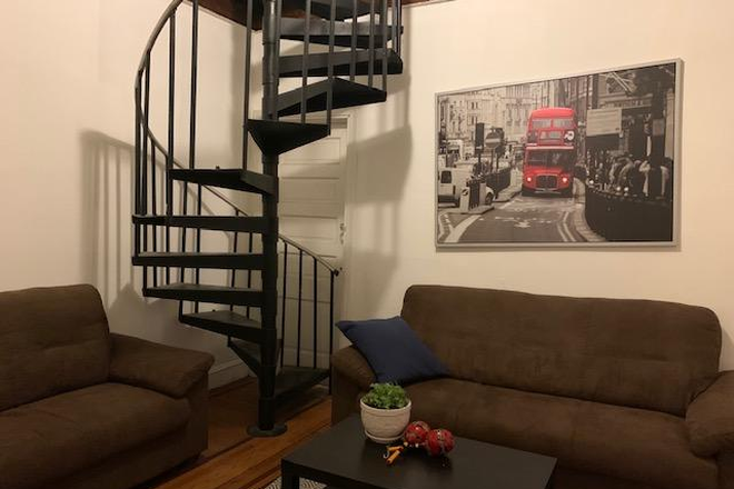 shared den with 20' ceiling - Safe & Secure: Tons of light, Furnished, Large 2-story shared unit Apartments