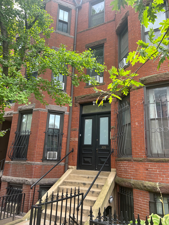 Classic New England red brick building, the unit is a walk-up located on the second floor - 399 Mass Ave Apartments Unit #4,