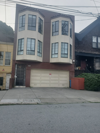 Building Front - Room Available in Remodeled Apartment