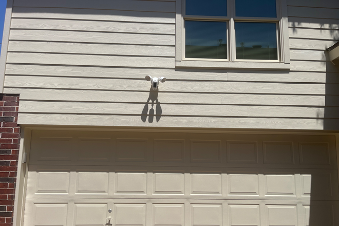 Exterior security camera and motion light - Garage Studio Near Rice U and TMC Apartments