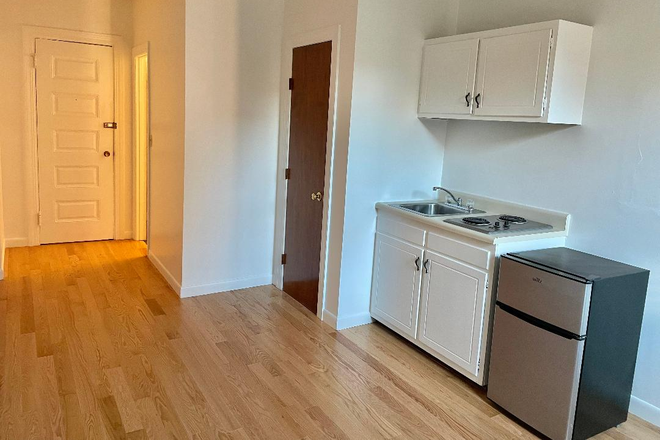 visit hubrealtyproperties.com - Beautiful studio in brownstone, on Beacon Street, on the green line T Apartments