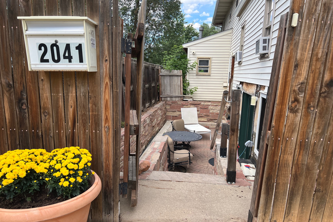 walk thru the gate and down the flagstone steps into your own sunken private courtyard - Just 2 blocks to Campus, spacious 2 bedroom with private garden courtyard Duplex