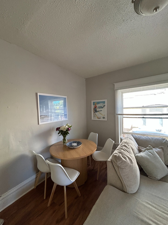 kitchen table in living room - Grey Goose - Fourstar Reality SPRING 26 Triplex