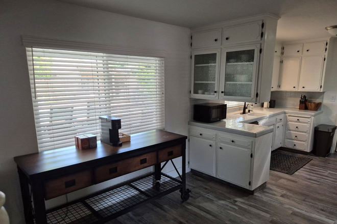 Brakfast nook and Kitchen Counters - Three bedroom, two bath, fully furnished with pool College area.