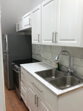 kitchen - Newly Renovated 4 Bedroom 1 Washroom Apartment at Bathurst and Habord