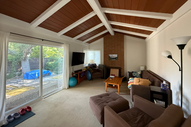 The den, with sliding door to the yard. - Furnished 2b/2b central Rockridge home, minutes from College Ave and BART