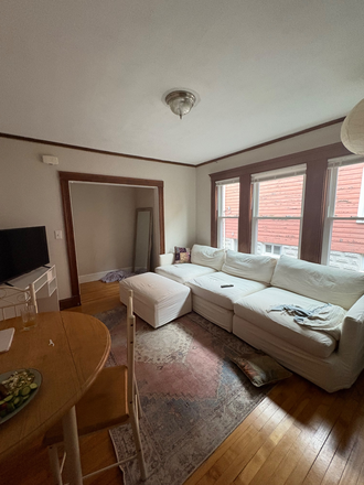 Living room - Sublease close to campus Duplex