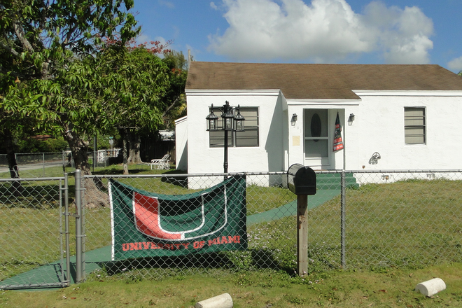 front exterior - AVOID TRAFFIC & CAMPUS PARKING! 2 blocks from UM, completely renovated 3/2 house w/ large yard!