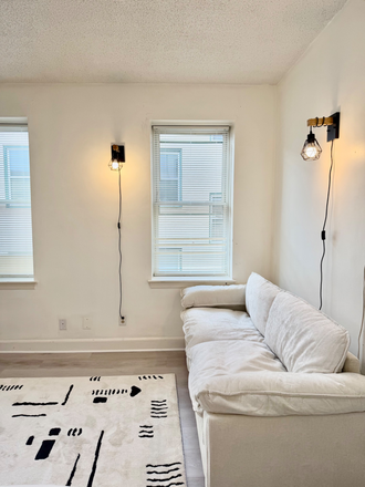 Living room - Furnished Studio Sunny AC Pool Top Floor Condo