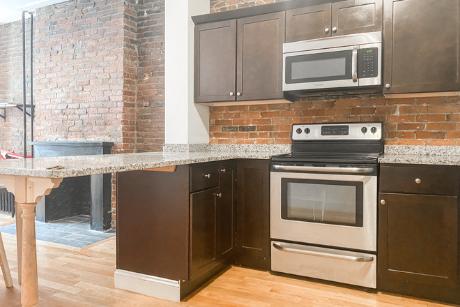 Kitchen - 4 Bedroom on Symphony Road with heat included Condo