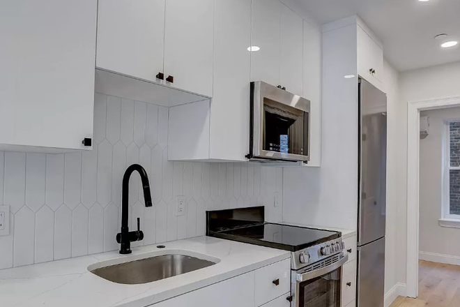 Call NOW for showings! 617-236-8550 - BARTLETT PL - *1/2 FEE* BRAND NEW RENO OF COZY 3BR ON QUIET SIDE ST *AVAIL NOW* W/ IN UNIT LNDRY, DW Apartments