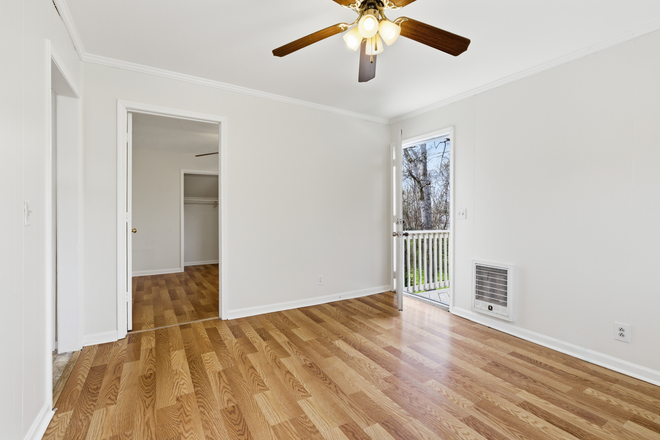 Living room 1 - 2-BR apartment minutes from campus, Wal-mart, Starbucks: water, lawncare, trash pickup include