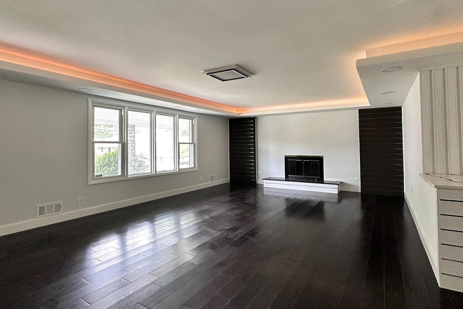 Main floor living room - Beautifully Renovated 2-Story House with 5 BR/4 Full Baths