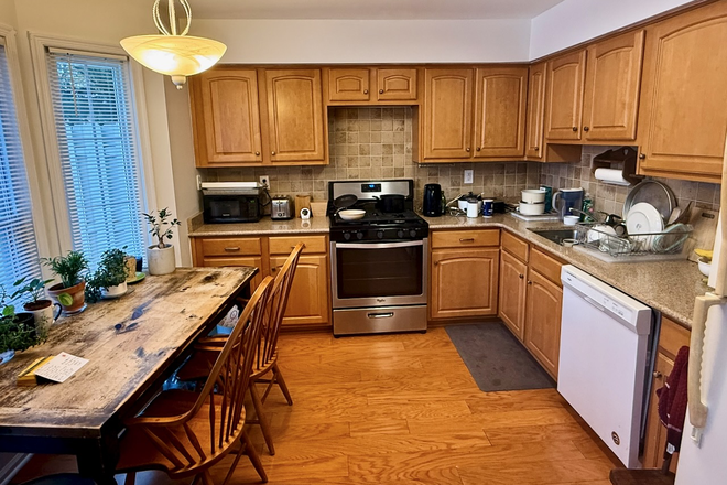 Kitchen with refrigerator, gas stove, dishwasher, breakfast table - Room in shared 3BR thome-Towpath Ct-Princeton