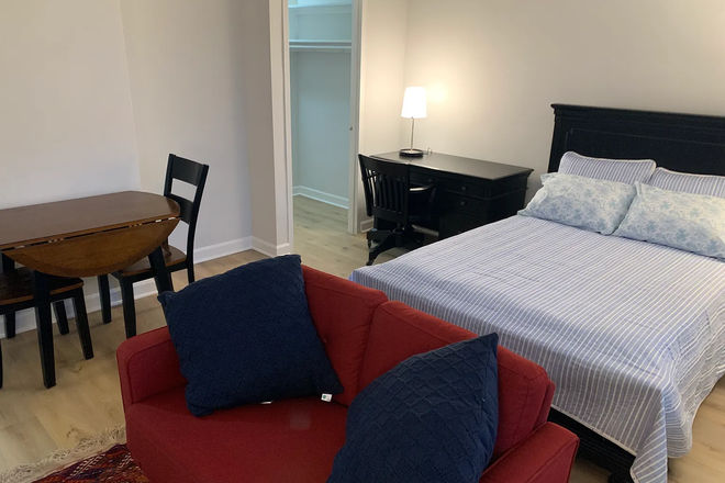 Main Room, drop-leaf table and desk - Beautiful Fully Furnished Rosslyn Studio in River Place South #510 Arlington VA Apartments