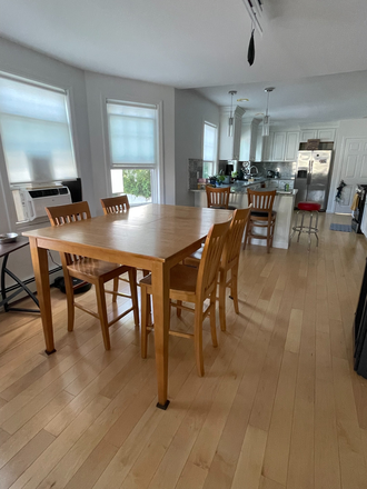Dining room (and kitchen, open floor plan) - Beautifully Renovated 3br - 2 occupant Apartment East Watertown, 3min Walk to 71