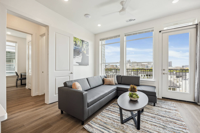 Living Room and Balcony - Summer Sublease - The Nest on Sunset (1b/1b in 6b/5b Unit)