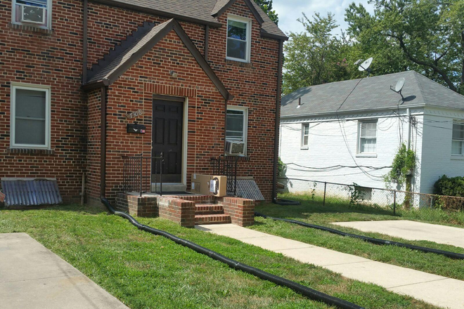 Front with 2 Off Street Parking - The Brick House