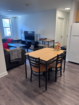 Living Room - Room in South Campus Commons 5 Apartments