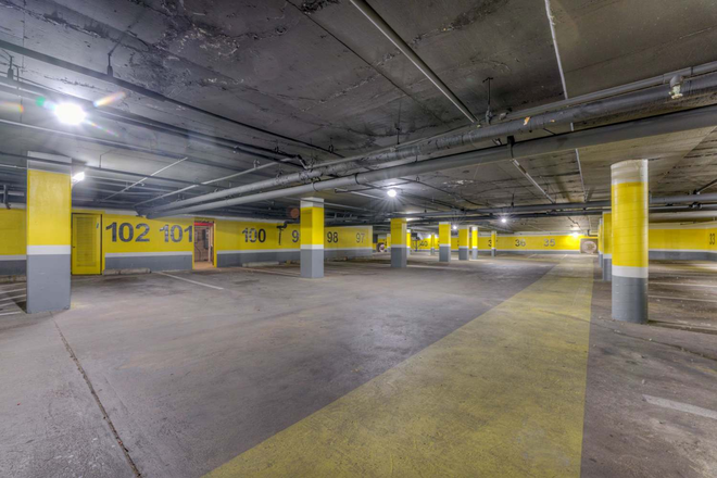 Gated Parking Garage - Iris Apartment 2x2