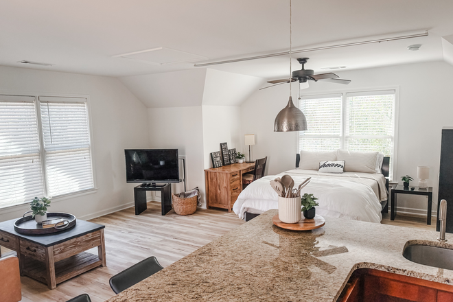 View from kitchenette into Bedroom - Turn Key Furnished Studio in DT  Decatur Apartments
