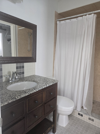 Bathroom 1 - Furnished 4-Bedroom 4-Bath Townhome, Ravine View, Steps to Streetsville GO, Near UTM by Transit