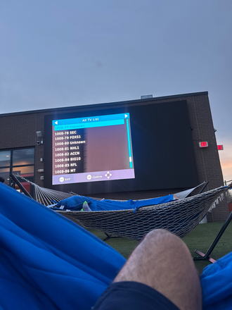 Jumbotron view w hammocks - The Standard at College Park Apartments
