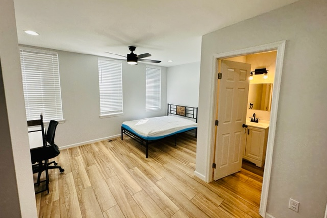 Bedroom with ensuite bathroom - Newly Renovated Apartment: Unmatched Comfort and Convenience, Steps from Hopkins Hospital