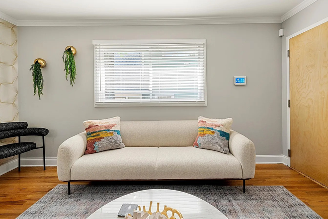 Staged or sample image of living room window angle - Top floor condo steps from beltline in the heart of all things Ponce and Virginia Highlands