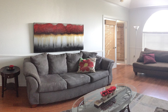 Living Room - University Inn Condo 2Bed/2Bath PENTHOUSE unit directly across from UM!