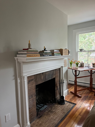 Decorative fireplace in room. - Beautiful Classic Room Available in Newly Remodeled 3bed/2bath Unit Triplex