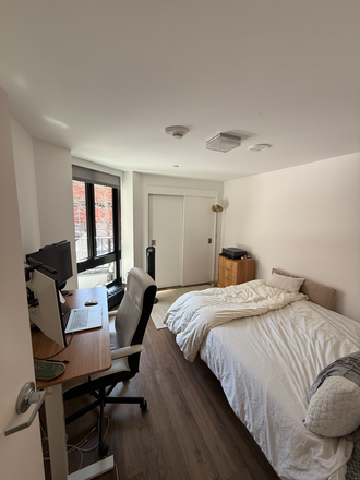 Bedroom with Desk - 1BDR fully furnished apt in SFP. Laundry in-unit, w/ balcony