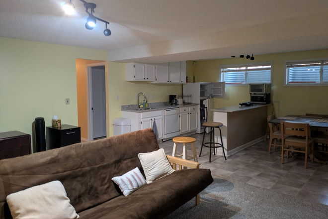 Living Room/Kitchen/Dining Room - Bright Big Basement Apartment