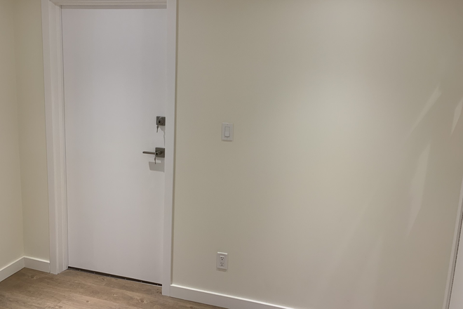 Entrance to unit - Rec renovated bsmt apt/1 bdrm+work area/4 pc bath/full kitch/shared laund + yard/sep. ent/1 car prk