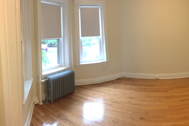 Visit hubrealtyproperties.com - Freshly painted studio with refinished hardwood floors and new kitchen Apartments