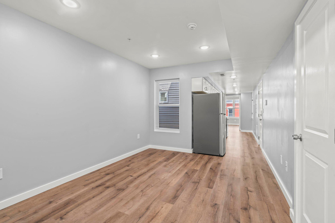 Living room, Kitchen - 1840 N Bouvier St #1 Condo