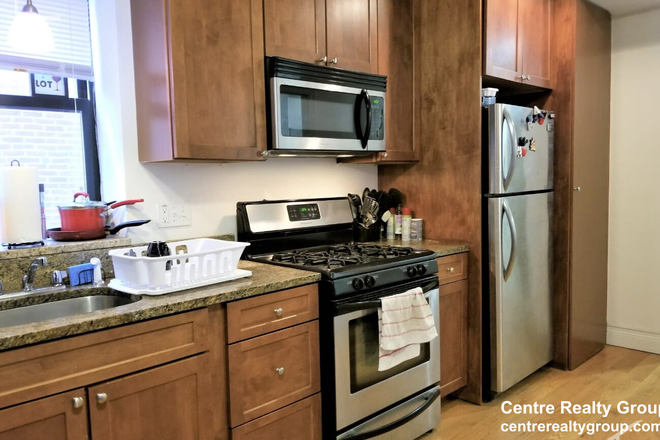 Kitchen - Large 4-bedroom with in-unit washer & dryer! avail. 9/1/25! Apartments