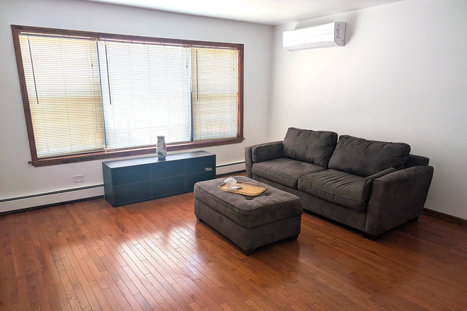 Livingroom - Rent by Room (furnished) at 3158 South Giles Avenue, Chicago, IL 60616 Apartments