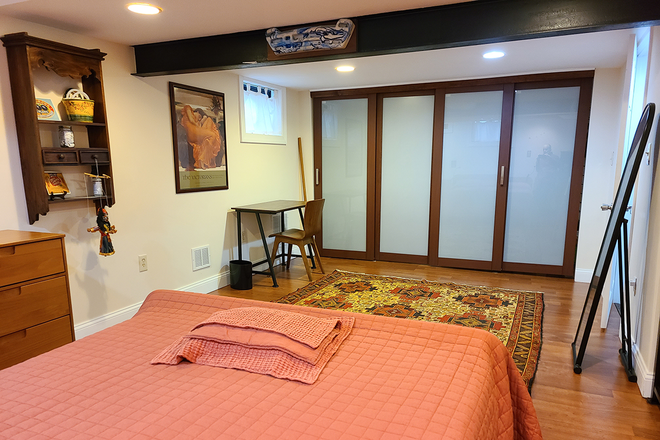 Bedroom, closet with sliding doors - Furnished basement suite in quiet private home with great location