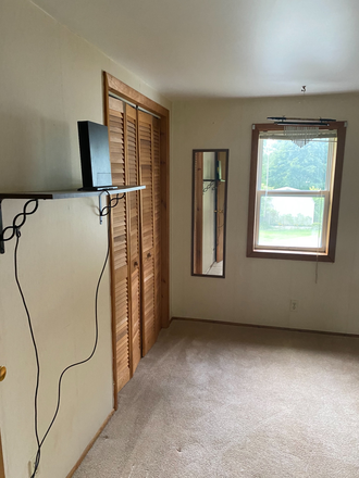 First bedroom left side - 690 South Windsor St. Apartments