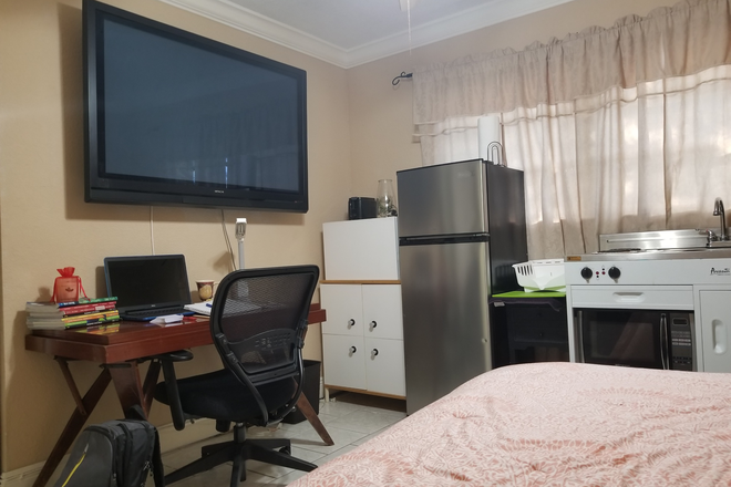 2nd Studio Kitchen, Pantry, & Fridge - 2 Furnished Studios for Rent | Close to FIU - (Power & Water incl) w/Full Kitchen, Fridge, WiFi, TV Apartments