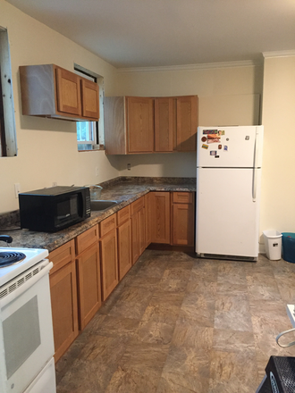 kitchen - Convenient —mile to UMASS, 3 min. to bus—furnished and quiet 2-3 bedroom $2200 including hot wate Triplex