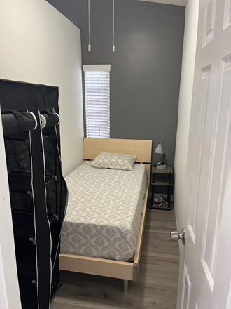 Small clean bedroom view from door - Room for rent in Tustin Condo