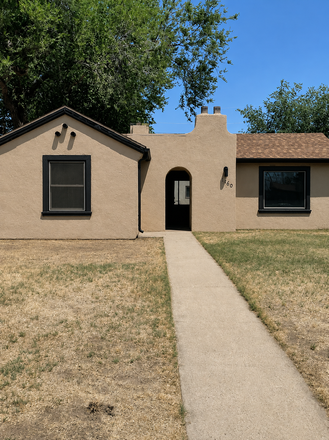 Front of house, ai generated, colors may be different than pictured - 3 BR, 1 bath house with 2 car garage, 1 block from campus, washer/dryer/dishwasher, fenced backyard,