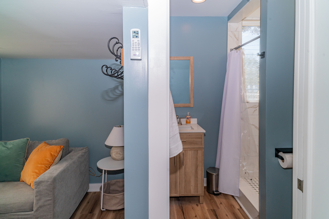 Living area/ bathroom - The Loft Nook