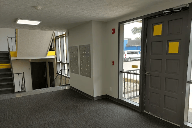 Main entrance - Qube Apartments