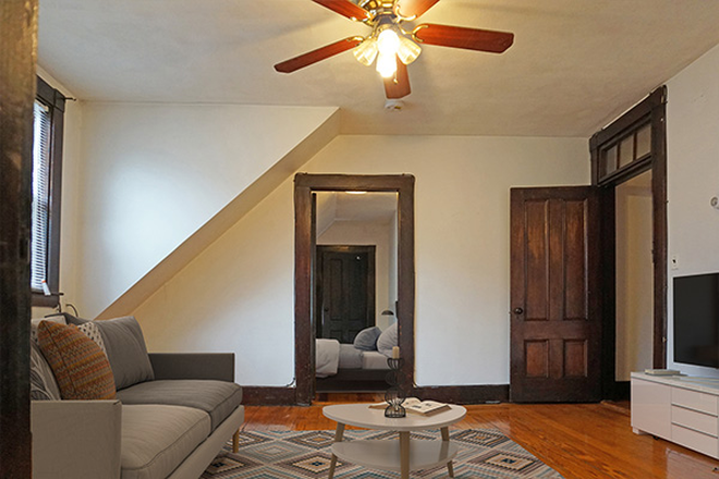 . - Sun drenched top floor 2 Bedroom apartment w/ a large deck
