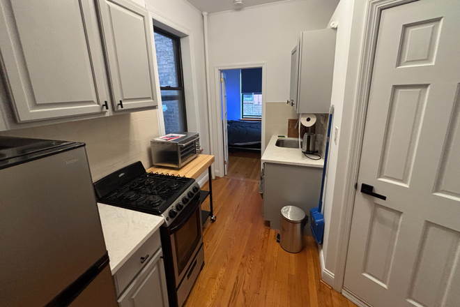 Kitchen - 1 Bedroom in East Village (Furnished) Apartments
