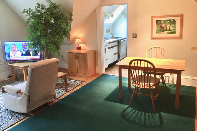 Living/Dining area looking toward kitchen - WALK TO HARVARD. Furnished 1-Bedroom & Study, in-unit washer/dryer + all utilities included. No fee. Apartments